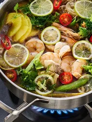 Lẩu cá chua vietnamien — hot pot au poisson