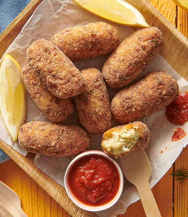 Cabillaud et croquettes de pommes de terre à la sauce tomate