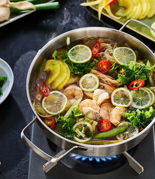 Lẩu cá chua vietnamien — hot pot au poisson