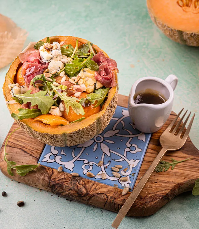 Salade de roquette au melon et prosciutto